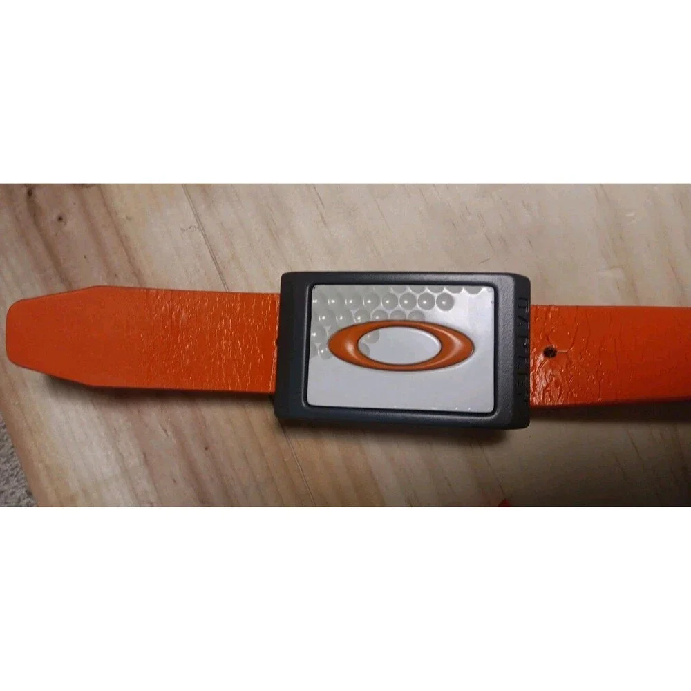 Vintage Oakley Metal Belt Buckle Golf With Distressed Orange Belt